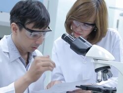 HD : Scientist discussing experiment Stock Footage