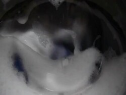 Laundry inside a washing machine drum Stock Footage