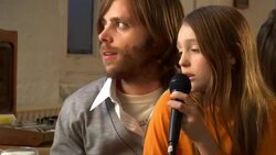 CU, PAN, Father with two children  (8-9,10-11)  playing and recording sound at home Stock Footage