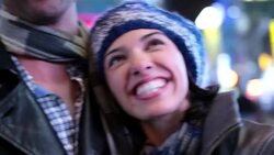 Young couple in love freak out in Times Square Stock Footage