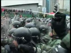 Protesters clash with police, anti-WTO march begins News Clip