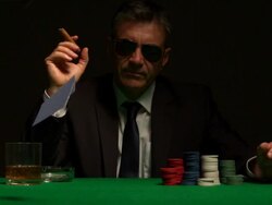Cool gambler playing poker in sunglasses Stock Footage