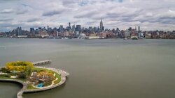 Manhattan, view of the Empire State Building and Midtown Manhattan across the Hudson River, New York, United States of America - Time lapse Stock Footage