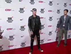 Machine Gun Kelly at The 2013 BMI R&B/Hip-Hop Awards - Cash Money Records' Bryan 'Birdman' Williams & Ronald 'Slim' Williams Honored As BMI Icons Stock Footage