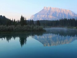 Reflection of  Mount Rundle on lake, Banff National Park Stock Footage