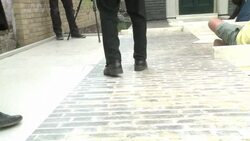 CLEAN : Art installation lets people climb walls News Clip