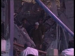 vox pops from scene of building collapse, plus rescue shots News Clip