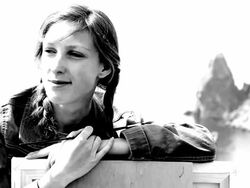 Girl draws on the beautiful coast Stock Footage