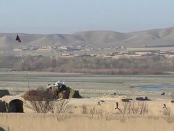 WS  Landscape with national flag / Musa Qala, Helmand Province, Afghanistan. Stock Footage
