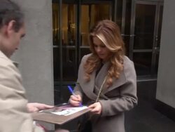 Candace Cameron Bure leaves the FOX & friends show, signs for a fan in New York City Stock Footage