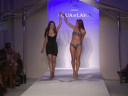 Reyhan Sofraci and model walk the runway during the Aqua Di Lara Swimwear 2011 fashion show at the Aqua Di Lara/Qiss Qiss - Runway - MBFW Miami Swim 2011 Stock Footage
