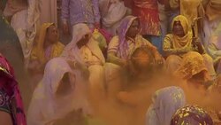 CLEAN : Indian widows mark Holi with burst of colour News Clip