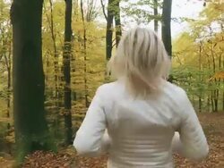 HD STEADY SHOT: Woman Running In Autumn Forest Stock Footage