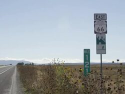 WS Shot of historic route 66 sign along side of highway / Seligman, Arizona, United States Stock Footage