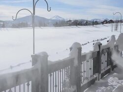 Snow Blowing on a Deck Stock Footage