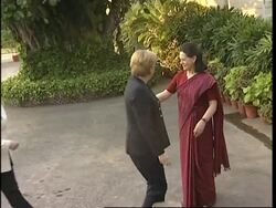 WRAP Chancellor meets Sonia Gandhi, handshake with Singh, presser News Clip