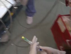 Doctors in emergency room working on unconscious patient Stock Footage