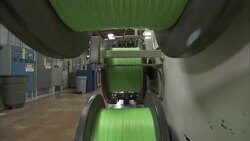 Green, plastic line fills spools. Stock Footage