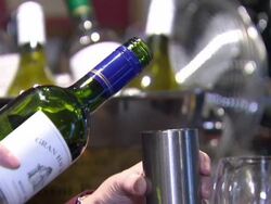 Wine Meaure Being Poured News Clip