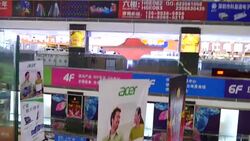 People in Shenzhen shopping for electronics News Clip