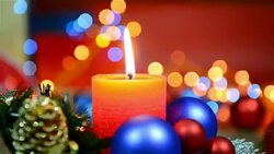 Christmas holiday decoration with candle, baubles and flashing lights Stock Footage