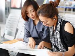 HD:Two Asian women looking the map. Stock Footage