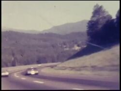 1970s North America: Cars On Highway Between Bridges (8mm Camera) Stock Footage