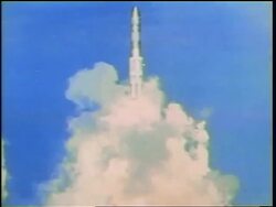 1960s wide shot tilt up missile blasting off in cloud of smoke / Cold War / documentary Stock Footage