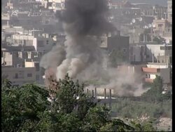 WRAP Fighting restarts in refugee camp, heavy shelling; ADDS more shots News Clip