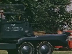 1939 Medium shot pan Soldier sitting in black Royal Air Force truck during war preparations / London, England  Stock Footage