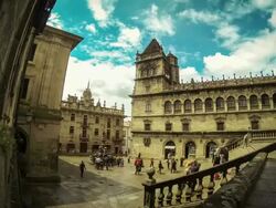 WS T/L View of people and tourists at Quintana square and clouds and rain moving away and blue sky coming out / Santiago de Compostela, Spain Stock Footage