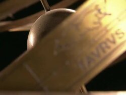 An armillary sphere rotates against a black background. Stock Footage
