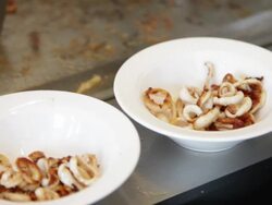 Octopus rings being cooked in Antwerp, Belgium Stock Footage