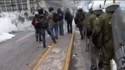Riot police, protesters clash outside parliament during general strike News Clip