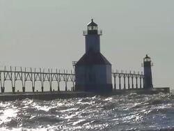 Waves to Lighthouse Zoom Out Stock Footage