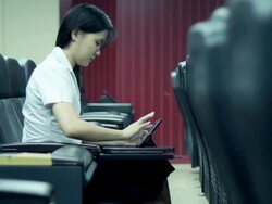 Collegian typing on digtal table Stock Footage