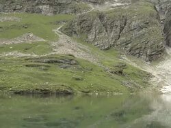 Pan left hemkund saheb lake chamoli uttarakhand india Stock Footage