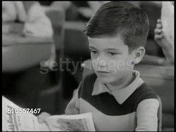 1950: DISTRICT 140: 2nd grade class w/  Stevie Riley socializing w/ others. FB Stevie Riley in 1st grade w/ book. DIFFERENT CLASS: Children in modern class room, Will Ann & Della May in class. FB  Will Ann & Della May last year. Children reading. Instructional Video