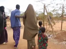 Family getting to refugee camp Stock Footage