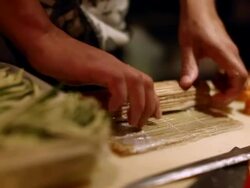 MS Shot of Japanese restaurant, Sushi prepared inside VW bus / Sao Paulo, Brazil  Stock Footage