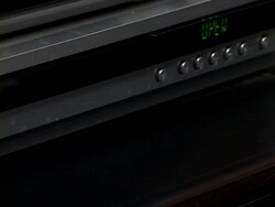 DVD disc out of player Stock Footage