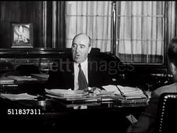 1947: STANDARD OIL (INDIANA): PRESS MEETING: Chairman of the Board & CEO Dr. Robert E. Wilson at desk talking about technology & able to make gas from oil shale, natural gas & coal...if & when need to supplement reserves of crude petroleum.' Instructional Video
