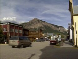Main street in Crested Butte, Colorado, Mt. Crested Butte in background Stock Footage