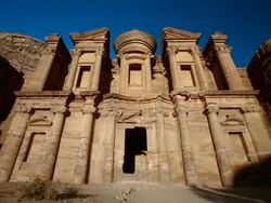 T/L, WS, sunset on El Deir (Monastery) at ancient stone city of Petra / Jordan Stock Footage