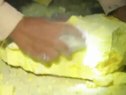 MS Miner collecting solid sulfur from inside the volcano at night / Ijen, Java, Indonesia Stock Footage