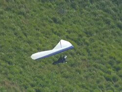 WS AERIAL ZI View of paragliding over cliff / Stanwell Park, Sydney New South Wales, Australia Stock Footage