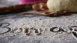Close up of words written in flour Stock Footage