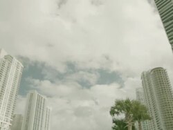 MS TD Shot of Miami tower blocks to yachts in canal between buildings / Miami, Florida, United States Stock Footage