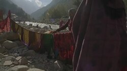 W/S CRANE UP pilgrims in Gangotri (source of the Ganges river) Stock Footage