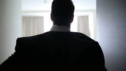 Businessman entering hotel room Stock Footage